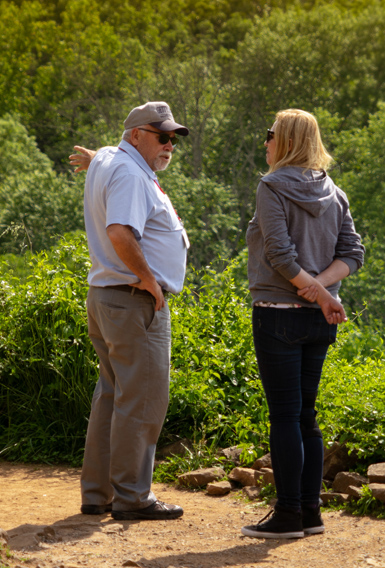Licensed Battlefield Guide talks with visitors on Little Round Top in Gettysburg